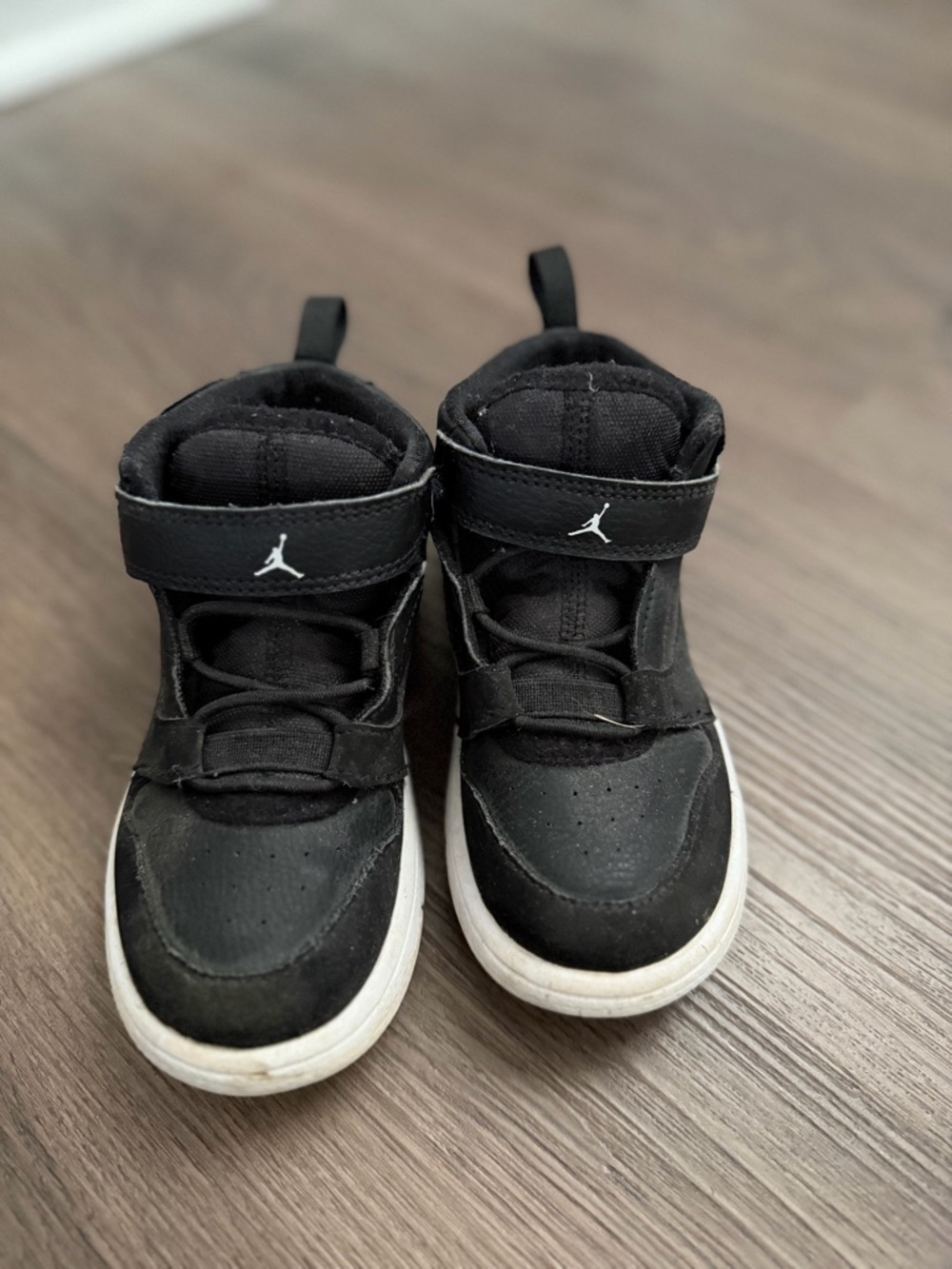Jordan Kids' Black and White High-Top Sneakers